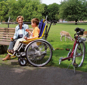 Vélo pousse-fauteuil détachable