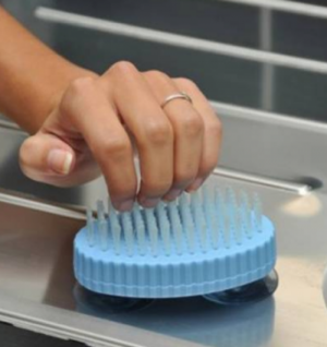 Brosse à ventouse